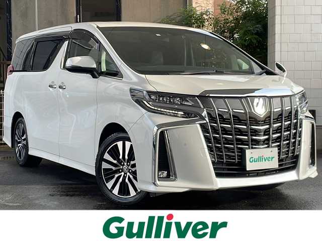 トヨタ アルファード S Cパッケージ 京都府 2020(令2)年 10.2万km ホワイトパールクリスタルシャイン 純正ＳＤナビ　/フルセグＴＶ/テレビキャンセラー　/Bluetooth/Miracast/CD/DVD再生機能有/USB/トヨタセーフティセンス　/禁煙車　/バックカメラ/フリップダウンモニター/（V12T-R68C)　/デジタルインナーミラー　/ウィンカーミラー/電動格納ミラー　/前後コーナーセンサー　/ＢＳＭ　/３眼ＬＥＤ　/オートライト/オートマチックハイビーム/クルコン追従有　/ポジションメモリー/前席＋2列目パワーシート/前席シートヒーター/エアシート/ハンドルヒーター/デュアルエアコン/オットマン/ウォークスルー/サンシェード/ETC/横滑り防止装置/レーンキープアシスト/盗難防止装置/Wサイドエアバッグ/カーテンエアバッグ