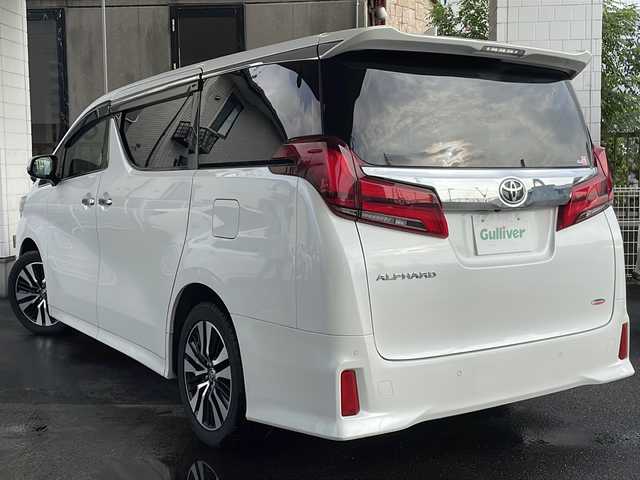 トヨタ アルファード S Cパッケージ 京都府 2020(令2)年 10.2万km ホワイトパールクリスタルシャイン 純正ＳＤナビ　/フルセグＴＶ/テレビキャンセラー　/Bluetooth/Miracast/CD/DVD再生機能有/USB/トヨタセーフティセンス　/禁煙車　/バックカメラ/フリップダウンモニター/（V12T-R68C)　/デジタルインナーミラー　/ウィンカーミラー/電動格納ミラー　/前後コーナーセンサー　/ＢＳＭ　/３眼ＬＥＤ　/オートライト/オートマチックハイビーム/クルコン追従有　/ポジションメモリー/前席＋2列目パワーシート/前席シートヒーター/エアシート/ハンドルヒーター/デュアルエアコン/オットマン/ウォークスルー/サンシェード/ETC/横滑り防止装置/レーンキープアシスト/盗難防止装置/Wサイドエアバッグ/カーテンエアバッグ