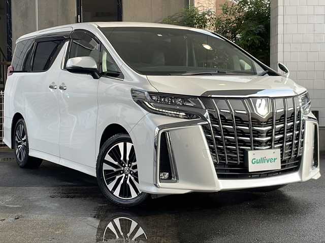 トヨタ アルファード S Cパッケージ 京都府 2020(令2)年 10.2万km ホワイトパールクリスタルシャイン 純正ＳＤナビ　/フルセグＴＶ/テレビキャンセラー　/Bluetooth/Miracast/CD/DVD再生機能有/USB/トヨタセーフティセンス　/禁煙車　/バックカメラ/フリップダウンモニター/（V12T-R68C)　/デジタルインナーミラー　/ウィンカーミラー/電動格納ミラー　/前後コーナーセンサー　/ＢＳＭ　/３眼ＬＥＤ　/オートライト/オートマチックハイビーム/クルコン追従有　/ポジションメモリー/前席＋2列目パワーシート/前席シートヒーター/エアシート/ハンドルヒーター/デュアルエアコン/オットマン/ウォークスルー/サンシェード/ETC/横滑り防止装置/レーンキープアシスト/盗難防止装置/Wサイドエアバッグ/カーテンエアバッグ