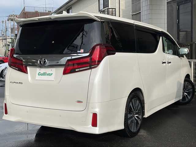 トヨタ アルファード S Cパッケージ 京都府 2020(令2)年 10.2万km ホワイトパールクリスタルシャイン 純正ＳＤナビ　/フルセグＴＶ/テレビキャンセラー　/Bluetooth/Miracast/CD/DVD再生機能有/USB/トヨタセーフティセンス　/禁煙車　/バックカメラ/フリップダウンモニター/（V12T-R68C)　/デジタルインナーミラー　/ウィンカーミラー/電動格納ミラー　/前後コーナーセンサー　/ＢＳＭ　/３眼ＬＥＤ　/オートライト/オートマチックハイビーム/クルコン追従有　/ポジションメモリー/前席＋2列目パワーシート/前席シートヒーター/エアシート/ハンドルヒーター/デュアルエアコン/オットマン/ウォークスルー/サンシェード/ETC/横滑り防止装置/レーンキープアシスト/盗難防止装置/Wサイドエアバッグ/カーテンエアバッグ