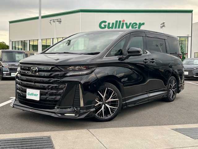 トヨタ ヴェルファイア ハイブリット Z プレミア 愛媛県 2023(令5)年 3.9万km ブラック ムーンルーフ/ワンオーナー/純正14型ナビ/フルセグTV/両側パワースライドドア/パワーバックドア/パノラミックビューモニター/ビルトインETC2.0/ドライブレコーダー/後席用フリップダウンモニター/駐車支援システム/レーダークルーズコントロール/コーナーセンサー/衝突被害軽減ブレーキ/車線逸脱防止支援システム/車線変更支援/ブラインドスポットモニター/デジタルインナーミラー/LEDヘッドランプ/デュアルオートエアコン/木目調/革巻きコンビステアリング/ステアリングヒーター/ナッパ革シート/前席/2列目シートヒーター/前席パワーシート/2列目エグゼクティブパワーシート/運転席ポジションメモリー/GRエアロ/マフラー/社外20インチアルミホイール/スマートキー/プッシュエンジンスタート/禁煙車