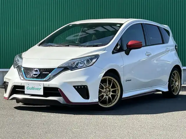 日産 ノート e－パワー ニスモ 宮城県 2019(平31)年 6.1万km ブリリアントホワイトパール LEDヘッドランプ/＝＝＝/インテリジェントエマージェンシーブレーキ/車線逸脱警報/踏み間違い衝突防止アシスト/コーナーセンサー/ハイビームアシスト/純正7インチナビ地図SD未到着・要確認/(フルセグTV/CD/DVD/SD/BT/AUX)/バックカメラ/ドライブレコーダー前後/社外デジタルミラー/ETC/オートエアコン/ドライブセレクト/革巻きステアリング/ステアリングスイッチ/フォグ/オートライト/プッシュスタート＆スマートキー/スペアキー/ウインカー付き電動格納ミラー/社外17インチAW（ENKEI）/RS-Rダウンサス/柿本マフラー/純正フロアマット