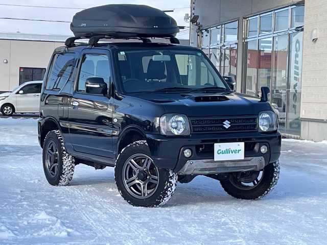 スズキ ジムニー ランドベンチャー 道北・旭川 2017(平29)年 4.3万km ブルーイッシュブラックパール3 /禁煙車//4WD//社外ナビ/CD/DVD/BT/TV/USB/SD//ヨコハマジオランダーM/Tタイヤ//社外足回り//ハーフレザーシート//運転席シートヒーター//ミラーヒーター//ETC//革巻きステアリング//ステアリングスイッチ//フォグランプ//ウィンカーミラー//電動格納ミラー//純正フロアマット//社外ルーフキャリア//社外ルーフボックス//保証書//取扱説明書