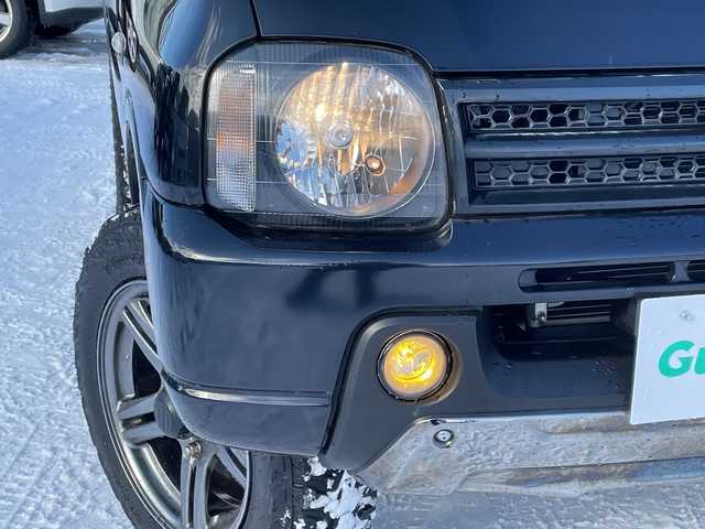 スズキ ジムニー ランドベンチャー 道北・旭川 2017(平29)年 4.3万km ブルーイッシュブラックパール3 /禁煙車//4WD//社外ナビ/CD/DVD/BT/TV/USB/SD//ヨコハマジオランダーM/Tタイヤ//社外足回り//ハーフレザーシート//運転席シートヒーター//ミラーヒーター//ETC//革巻きステアリング//ステアリングスイッチ//フォグランプ//ウィンカーミラー//電動格納ミラー//純正フロアマット//社外ルーフキャリア//社外ルーフボックス//保証書//取扱説明書