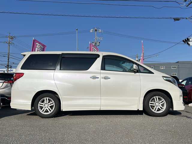 トヨタ アルファード 240S 道央・札幌 2012(平24)年 12万km ホワイトパールクリスタルシャイン /禁煙ワンオーナー//ディーラーナビ(NHZN-X61G 76050)//ワンセグTV/BT/USB/SD/CD/DVD//バックカメラ//ETC//社外エアロ//両側パワースライドドア//横滑り防止装置//シートリフター//オートライト//電動格納ミラー//ナノイー搭載エアコン//純正フロアマット//ドアバイザー//ステアリングスイッチ//革巻きコンビステアリング//プッシュスタート//クリアランスソナー//木目調パネル//革調シート(Clazzo S)//オットマン付きキャプテンシート//ECO MODE//後席ムードイルミネ//ドアカーテシランプ//フォグランプ//純正アルミ＋サマータイヤ付き(215/65/R16)//取扱説明書