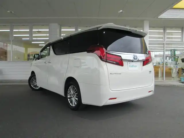 トヨタ アルファードハイブリット G 千葉県 2018(平30)年 9.4万km ラグジュアリーホワイトパールクリスタルシャインガラスフレーク 純正10型ナビ、フルセグTV(走行中視聴可)/バックカメラ/純正オーディオ【DVD/CD/BT/SD】/純正12.1型後席フリップダウンモニター/Toyota Safety Sense/ツインムーンルーフ/ベージュ本革シート/両側パワースライドドア/パワーバックドア/LEDヘッドライト&LEDフォグランプ/レーダークルーズコントロール/レーンキープアシスト/クリアランスソナー/運転席メモリ機能付き前席パワーシート/前席シートヒーター&エアシート/ナビ連動ステアリングスイッチ付きウッドコンビステアリング/純正前方ドライブレコーダー/スペアタイヤ/ビルトインETC2.0/スペアキー/取扱説明書/ナビ取扱説明書/新車時保証書/整備記録簿(R1/2/3/4/5/6)