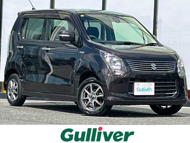 スズキ ワゴンＲ 20周年記念車 山形県 2014(平26)年 8.1万km アーバンブラウンパールメタリック 4WD/衝突被害軽減システム/横滑り防止装置/D席シートヒーター/カロッツェリアカーステレオ/オートライト/オートエアコン/AUX/電動格納ミラー/ドアバイザー/スペアキー1本/スマートキー