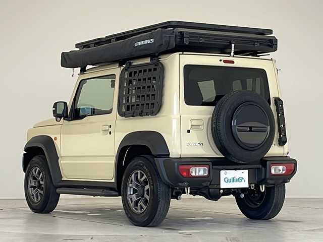 スズキ ジムニー シエラ JC 愛知県 2024(令6)年 0.3万km シフォンアイボリーM GI WORKSルーフトップテント/GI WORKSルーフラック/GI WORKSサイドオーニング/サイドステップ/スズキセフーフティサポート/衝突被害軽減ブレーキ/7インチディスプレイオーディオナビ（ナビ無し）/クルーズコントロール/シートヒーター/Bluetooth/バックカメラ/コーナーセンサー/純正アルミホイール/4WD/LEDヘッドライト/ダウンヒルアシストコントロール/オートマチックハイビーム/ドライブレコーダー/ステアリングスイッチ/スマートキー/プッシュスタート
