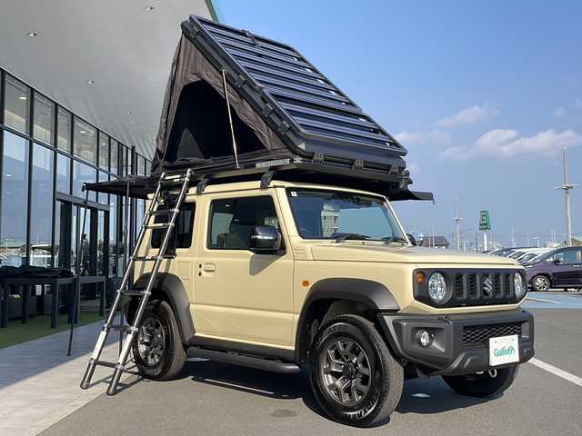 スズキ ジムニー シエラ JC 愛知県 2024(令6)年 0.3万km シフォンアイボリーM GI WORKSルーフトップテント/GI WORKSルーフラック/GI WORKSサイドオーニング/サイドステップ/スズキセフーフティサポート/衝突被害軽減ブレーキ/7インチディスプレイオーディオナビ（ナビ無し）/クルーズコントロール/シートヒーター/Bluetooth/バックカメラ/コーナーセンサー/純正アルミホイール/4WD/LEDヘッドライト/ダウンヒルアシストコントロール/オートマチックハイビーム/ドライブレコーダー/ステアリングスイッチ/スマートキー/プッシュスタート