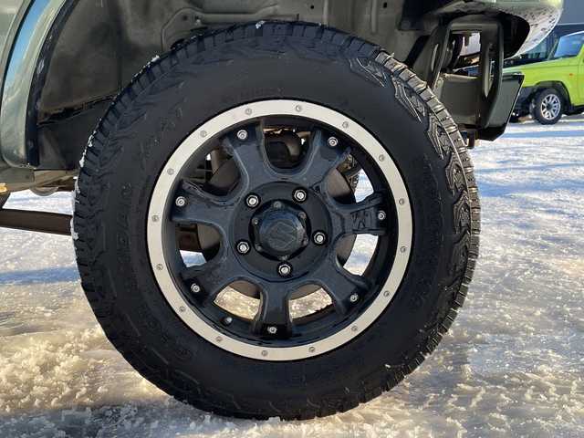 スズキ ジムニー ランドベンチャー 道北・旭川 2014(平26)年 5.4万km クールカーキPM /4WD//禁煙車//社外メモリナビ//CD/DVD/BT/SD/USB/MSV/フルセグ//リフトアップ//社外足廻り//社外LEDテール//社外ラテラルロッド//室内ロッドホルダー//社外ショートバンパー//ハーフレザーシート//運転席シートヒーター//ミラーヒーター//ステアリングスイッチ//革巻きステアリング//ウィンカーカーミラー//純正フロアマット//ドアバイザー//社外LEDヘッドライト