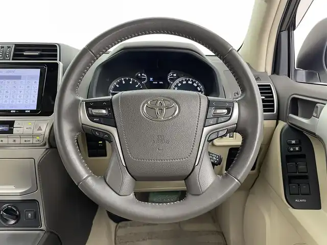 トヨタ ランドクルーザー プラド TX Lパッケージ 大分県 2020(令2)年 4.6万km ホワイトパールクリスタルシャイン 純正９インチナビ/フルセグ/DVD/Bluetooth/プリクラッシュセーフティー/サンルーフ/モデリスタエアロ/バックモニター/エアシートヒーター/レーダークルーズコントロール/前席パワーシート/ルーフレール/純正フロアマット/ＥＴＣ/オートＬＥＤライト/スマートキーX2