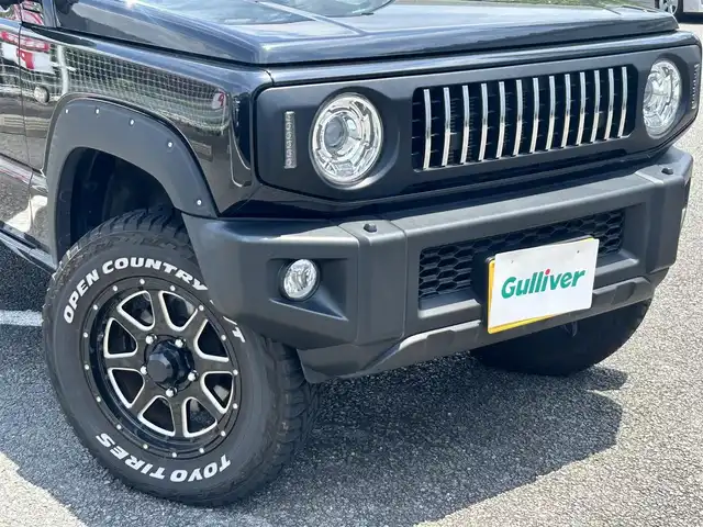 スズキ ジムニー XC 静岡県 2021(令3)年 1.5万km ブルーイッシュブラックパール3 ~4WD＆ターボ~/ユーザー買取車両/セーフティサポート装着車/純正LEDヘッドライト/社外SDナビ/　【CD/DVD/BT/地デジフルセグTV】/社外16インチAW/社外グリル（純正グリル積み込み）/バックカメラ/ETC/シートヒーター/衝突被害軽減システム/車線逸脱警報/アイドリングストップ/ダウンヒルコントロール/オーバーフェンダー