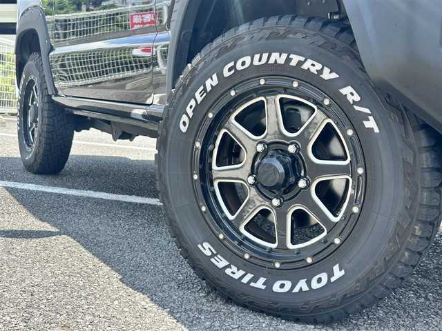 スズキ ジムニー XC 静岡県 2021(令3)年 1.5万km ブルーイッシュブラックパール3 ~4WD＆ターボ~/ユーザー買取車両/セーフティサポート装着車/純正LEDヘッドライト/社外SDナビ/　【CD/DVD/BT/地デジフルセグTV】/社外16インチAW/社外グリル（純正グリル積み込み）/バックカメラ/ETC/シートヒーター/衝突被害軽減システム/車線逸脱警報/アイドリングストップ/ダウンヒルコントロール/オーバーフェンダー