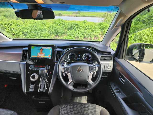 三菱 デリカＤ：５ P 福岡県 2021(令3)年 1.7万km 黒 社外９インチナビ・フルセグTV/（Bluetooth・DVD再生・HDMI入力）/全方位モニター/両側パワースライドドア/パワーバックドア/オートステップ/E-アシスト/・レーダークルーズコントロール/・衝突軽減ブレーキ/前席シートヒーター/社外グリル/（純正グリル車内積み）/純正１８インチアルミホイール/社外前後ドライブレコーダー/純正LEDヘッドライト・フォグランプ/D席パワーシート/新車時保証書/取扱説明書