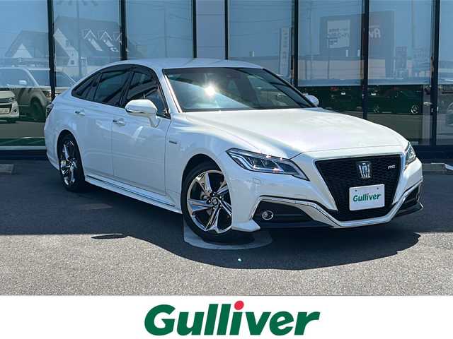 トヨタ クラウン ハイブリッド RS 岐阜県 2018(平30)年 4.2万km ホワイトパールクリスタルシャイン 登録時走行距離41238km/ディスプレイオーディオ（TコネクトSDナビ）/フルセグＴＶ/バックカメラ/Blue tooth・CD・USB入力端子・ビルトインETC/ワンオーナー/トヨタセーフティセンス/プリクラッシュセーフティ（衝突回避支援）/先行車発進告知機能/コーナーセンサー前後/レーダークルーズコントロール/レーンキープアシスト/ＬＥＤヘッドライト/フロントフォグランプ/オートマチックハイビーム/オートライト/横滑り防止装置/盗難防止装置/SRSエアバッグ運転席・助手席/カーテンエアバッグ/布系シート/パワーシート前席/シートヒーター前席/フルフラットシート/純正フロアマット/ステアリングヒーター/パドルシフト/純正18アルミホイール/プッシュスタート/スマートキー/スペアキー1本/アイドリングストップ/保証書/取扱説明書/ドアバイザー