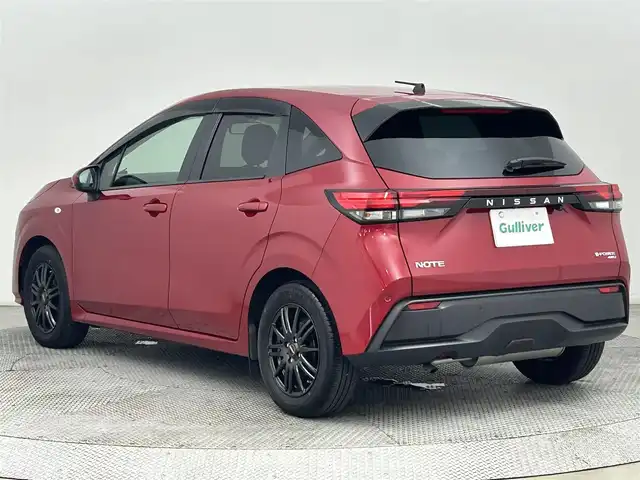 日産 ノート S FOUR 道央・札幌 2021(令3)年 1.7万km ガーネットレッド ・４WD/・純正9インチナビ/　CD/DVD/SD/BT/フルセグ/・バックカメラ/・ETC/・純正前方ドライブレコーダー/・エマージェンシーブレーキ/・レーンキープアシスト/・クリアランスソナー/・オートハイビーム/・アイドリングストップ/・前席シートヒーター/・ステアリングヒーター/・ライトレベライザー/・社外アルミホイール/・プッシュスタート/・スマートキー/・純正フロアマット/・ドアバイザー