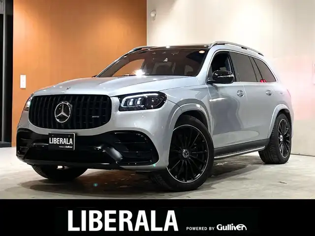 メルセデス・ベンツ Ｍ・ベンツ ＧＬＳ４５０ｄ 4マチック 道央・札幌 2024(令6)年 1.7万km ハイテックシルバー AMGラインパッケージ/　・AMGラインエクステリア/　・22インチAMGアルミホイール/　・アンスラサイトオークウッドインテリアトリム/レーダーセーフティパッケージ/パノラミックスライディングルーフ/パナメリカーナグリル/GLS63フロントバンパー/GLS63仕様マフラー/Ｂｕｒｍｅｓｔｅｒサラウンドサウンドシステム/MBUX ARナビゲーションシステム/ドアクロージングサポーター/黒革シート/前席シートヒーター＆ベンチレーター/後席パワーシート＆シートヒーター/ステアリングヒーター/ 温冷機能付きカップホルダー/ワイヤレスチャージング