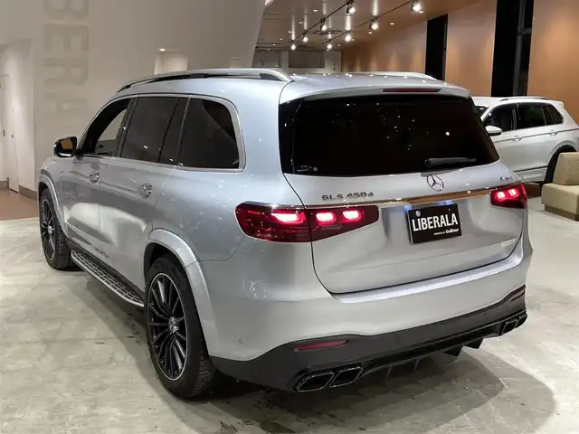 メルセデス・ベンツ Ｍ・ベンツ ＧＬＳ４５０ｄ 4マチック 道央・札幌 2024(令6)年 1.7万km ハイテックシルバー AMGラインパッケージ/　・AMGラインエクステリア/　・22インチAMGアルミホイール/　・アンスラサイトオークウッドインテリアトリム/レーダーセーフティパッケージ/パノラミックスライディングルーフ/パナメリカーナグリル/GLS63フロントバンパー/GLS63仕様マフラー/Ｂｕｒｍｅｓｔｅｒサラウンドサウンドシステム/MBUX ARナビゲーションシステム/ドアクロージングサポーター/黒革シート/前席シートヒーター＆ベンチレーター/後席パワーシート＆シートヒーター/ステアリングヒーター/ 温冷機能付きカップホルダー/ワイヤレスチャージング