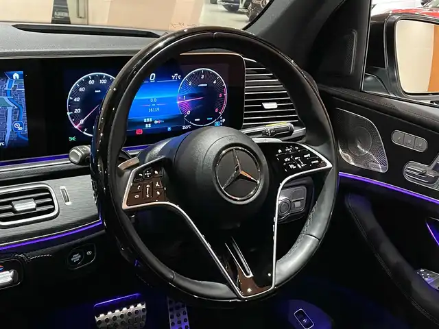 メルセデス・ベンツ Ｍ・ベンツ ＧＬＳ４５０ｄ 4マチック 道央・札幌 2024(令6)年 1.7万km ハイテックシルバー AMGラインパッケージ/　・AMGラインエクステリア/　・22インチAMGアルミホイール/　・アンスラサイトオークウッドインテリアトリム/レーダーセーフティパッケージ/パノラミックスライディングルーフ/パナメリカーナグリル/GLS63フロントバンパー/GLS63仕様マフラー/Ｂｕｒｍｅｓｔｅｒサラウンドサウンドシステム/MBUX ARナビゲーションシステム/ドアクロージングサポーター/黒革シート/前席シートヒーター＆ベンチレーター/後席パワーシート＆シートヒーター/ステアリングヒーター/ 温冷機能付きカップホルダー/ワイヤレスチャージング