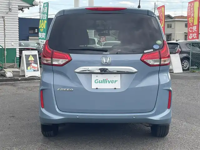 ホンダ フリード G ホンダセンシング 福島県 2020(令2)年 4.7万km シーグラスブルーパール ４WD/両側パワースライドドア /後席フリップダウンモニター/純正ナビ/バックカメラ/レーンアシスト /クルーズコントロール/ドライブレコーダー/ビルトインETC/シートヒーター/プッシュスタート