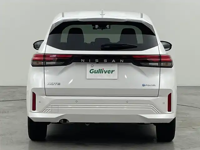 日産 ノート X 福岡県 2024(令6)年 0.3万km ピュアホワイトパール 純正ナビ（ＢＴ，フルセグＴＶ）　/アラウンドビューモニター　/前方ドライブレコーダー　/コーナーセンサー　/エマージェンシーブレーキ　/レーンキープ　/ＢＳＭ　/インテリジェントルームミラー　/電動格納式ドアミラー