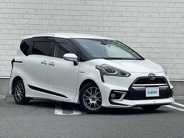 トヨタ シエンタ ハイブリッド G 山形県 2016(平28)年 7.6万km ホワイトパールクリスタルシャイン ワンオーナー/モデリスタエアロ/モデリスタマフラー/Toyota Safety Sense C/・プリクラッシュセーフティ/・レーンディパーチャーアラート/・オートマチックハイビーム/・先行車発進告知（発進遅れ告知機能）/両側パワースライドドア/純正ナビ(CD.DVD.BT.SD)/フルセグ/バックカメラ/ETC/ドライブレコーダー/GPSレーダー/純正エンジンスターター/プッシュスタート/スマートキーｘ２/ＬＥＤヘッドライト