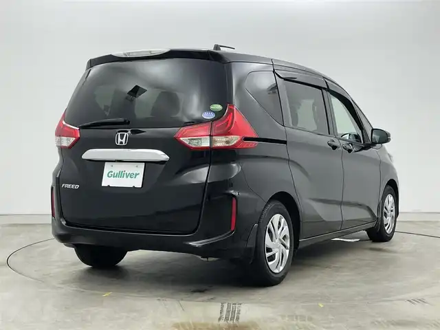 ホンダ フリード G ホンダセンシング 岡山県 2018(平30)年 6.1万km プレミアムスパークルブラックパール 社外9インチフリップダウンモニター/社外8インチSDナビゲーション(AVIC-CL901)/　【CD/DVD/BT]/追従型クルーズコントロール/LEDヘッドライト（AUTO機能付き）/純正フロアマット/プッシュスタート/衝突軽減ブレーキシステム/車線逸脱防止システム/バックカメラ/ビルトインETC/両側パワースライドドア/社外ドライブレコーダー/ドアバイザー/社外レーダー