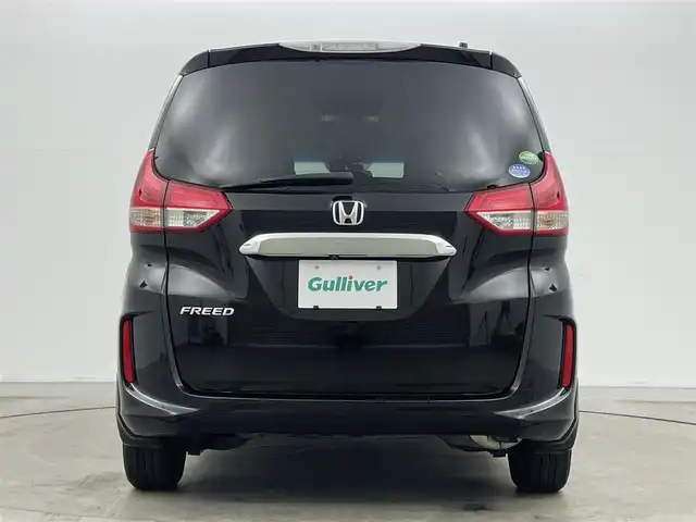 ホンダ フリード G ホンダセンシング 岡山県 2018(平30)年 6.1万km プレミアムスパークルブラックパール 社外9インチフリップダウンモニター/社外8インチSDナビゲーション(AVIC-CL901)/　【CD/DVD/BT]/追従型クルーズコントロール/LEDヘッドライト（AUTO機能付き）/純正フロアマット/プッシュスタート/衝突軽減ブレーキシステム/車線逸脱防止システム/バックカメラ/ビルトインETC/両側パワースライドドア/社外ドライブレコーダー/ドアバイザー/社外レーダー