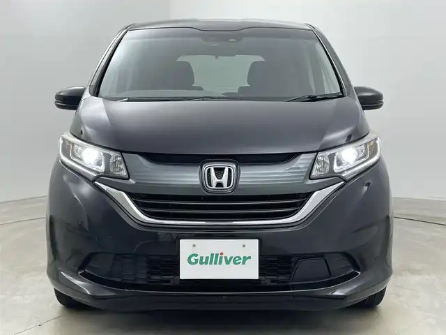 ホンダ フリード G ホンダセンシング 岡山県 2018(平30)年 6.1万km プレミアムスパークルブラックパール 社外9インチフリップダウンモニター/社外8インチSDナビゲーション(AVIC-CL901)/　【CD/DVD/BT]/追従型クルーズコントロール/LEDヘッドライト（AUTO機能付き）/純正フロアマット/プッシュスタート/衝突軽減ブレーキシステム/車線逸脱防止システム/バックカメラ/ビルトインETC/両側パワースライドドア/社外ドライブレコーダー/ドアバイザー/社外レーダー