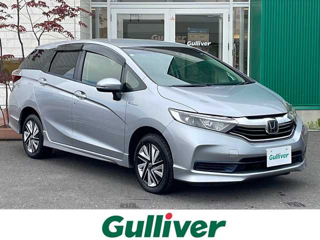 ホンダ シャトル ハイブリッド ホンダセンシング 青森県 2020(令2)年 10.8万km ルナシルバーM 4WD/社外メモリナビ/CD・Bluetooth・SD/バックカメラ/ホンダセンシング/アダプティブクルーズコントロール/誤発進抑制機能/車線維持支援システム/衝突軽減ブレーキ/横滑り防止装置/ワイパーデアイサー/ETC/トノカバー/スマートキー/プッシュスタート