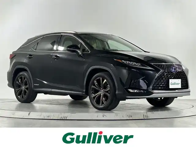 レクサス ＲＸ 450h バージョンL 佐賀県 2019(令1)年 5.9万km グラファイトブラックガラスフレーク 純正12.3インチナビ/フルセグTV/CD/DVD/Bluetooth/全方位カメラ/サンルーフ/衝突被害軽減システム/ヘッドアップディスプレイ/ブラインドスポットモニター/レーダークルーズコントロール/レーンアシスト/ロードサインアシスト/パーキングサポートブレーキ/オートライト/オートマチックハイビーム/3眼LEDヘッドライト/LEDフォグライト/純正前方ドライブレコーダー/ビルトインETC2.0/パワーバックドア/電子パーキング/ブレーキホールド/ステアリングヒーター/運転席・助手席パワーシート/運転席・助手席メモリーシート/全席シートヒーター/運転席・助手席エアシート/レザーシート/ISOFIX対応/ルーフレール/後席サンシェード/純正20インチアルミホイール/純正フロアマット/スマートキー×２/カードキー×１