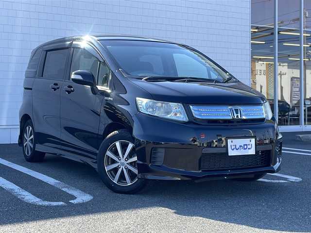ホンダ フリード スパイク ハイブリット ジャストセレクション 熊本県 2013(平25)年 8万km プレミアムスパークルブラックパール (株)IDOMが運営する【じしゃロン熊本店】の自社ローン対象車両になります。こちらは現金ご利用時の価格です。/自社ローンご希望の方は別途その旨お申付け下さい。/純正ナビ（ＶＸＭ－１４５ＶＳｉ）　/片側パワースライドドア　/ＥＴＣ　/クルーズコントロール　/ドライブレコーダー　/Ｗエアバッグ　/純正マット　/純正アルミ　/オートライト　/ステアリングスイッチ　/電動格納ミラー