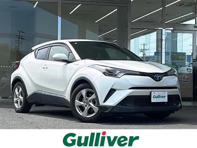 トヨタ Ｃ－ＨＲ S LEDパッケージ 福島県 2018(平30)年 6.6万km ホワイトパールクリスタルシャイン 登録時走行距離：65897km/社外SDナビ/ (BT/フルセグTV/CD/DVD/HDMI/SD/AM/FM)/バックカメラ/プッシュスタート/ビルトインETC/クルーズコントロール/ステアリングスイッチ/電動格納ミラー/ウィンカーミラー/フロアマット/オートライト/オートマチックハイビーム/LEDヘッドライト/純正17インチAW/横滑り防止装置/レーンキープアシスト/車両接近通報装置/スマートキー/スペアキー×１/保証書/取扱説明書