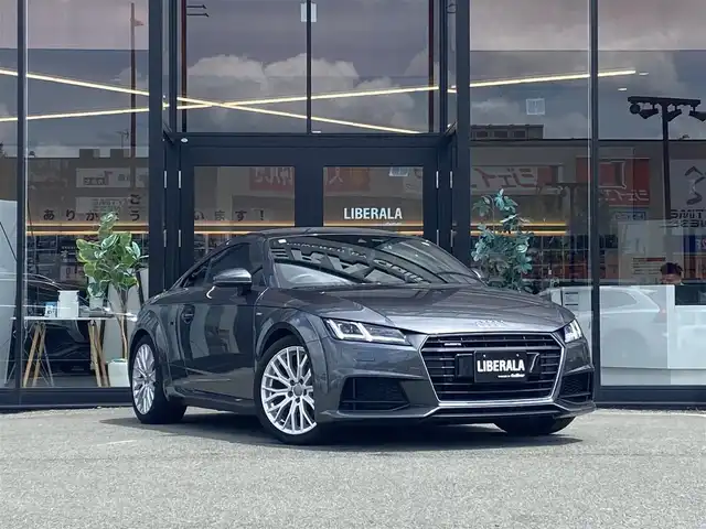 アウディ ＴＴクーペ 2．0 TFSI クワトロ 福岡県 2018(平30)年 3.2万km デイトナグレーパールエフェクト ・クルーズコントロール/・ナビ／ＵＳＢ／Ｂｌｕｅｔｏｏｔｈ/・バックカメラ/・ハーフレザーシート/・ドライブレコーダー/・フルセグテレビ/・ＥＴＣ/・純正１８インチＡＷ/・電動リアスポイラー/・AutoHOLD／電子パーキング