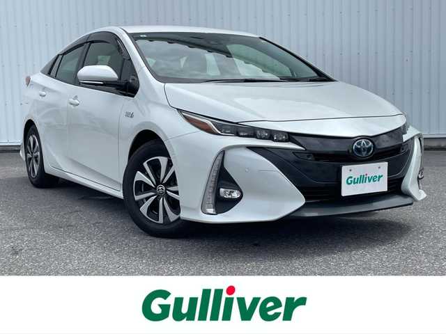 トヨタ プリウス ＰＨＶ A 滋賀県 2021(令3)年 0.5万km プラチナホワイトパールマイカ ワンオーナー/純正８型ディスプレイ/・Bluetooth/フルセグ/・Mira Cast/パノラミックビューモニター/ステアリングリモコン/革巻きステアリング/ステアリングヒーター/ビルトインETC2.0/AC100V/前席シートヒーター/運転席パワーシート/ヘッドアップディスプレイ/パーキングアシスト/LEDオートライト/フォグライト/オートハイビーム/トヨタセーフティセンス/・プリクラッシュセーフティ/・ブラインドスポットモニター/・レーントレーシングアシスト/・クリアランスソナー/・パーキングサポートブレーキ/・ふらつき検知/・ロードサインアシスト/スマートキー