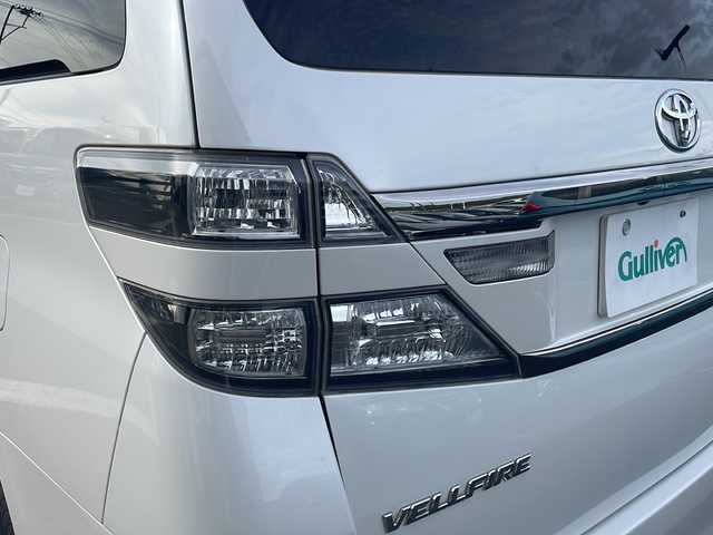 トヨタ ヴェルファイア 2．4Z ゴールデンアイズⅡ 新潟県 2013(平25)年 14.4万km ホワイトパールクリスタルシャイン ４WD/SDナビ/（DTV/DVD/Bluetooth）/フリップダウンモニター/バックカメラ/コーナーセンサー/クルーズコントロール/ETC/MTモード付AT/プッシュスタート/ハーフレザーシート/オットマン/両側パワースライドドア/パワーバックドア/フロアマット/社外LEDヘッドライト/フォグランプ/ウィンカーミラー/電格ミラー