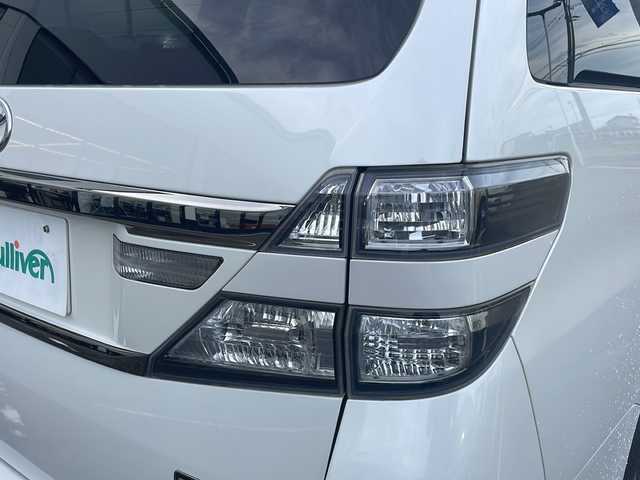 トヨタ ヴェルファイア 2．4Z ゴールデンアイズⅡ 新潟県 2013(平25)年 14.4万km ホワイトパールクリスタルシャイン ４WD/SDナビ/（DTV/DVD/Bluetooth）/フリップダウンモニター/バックカメラ/コーナーセンサー/クルーズコントロール/ETC/MTモード付AT/プッシュスタート/ハーフレザーシート/オットマン/両側パワースライドドア/パワーバックドア/フロアマット/社外LEDヘッドライト/フォグランプ/ウィンカーミラー/電格ミラー