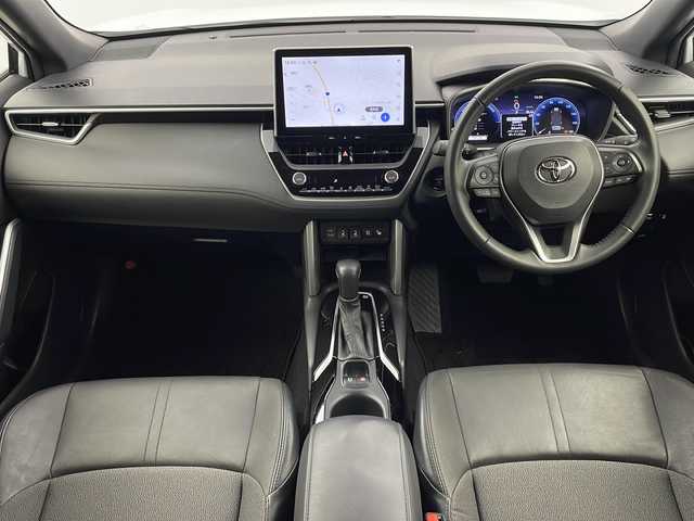 トヨタ カローラ クロス ハイブリッド Z 栃木県 2024(令6)年 3.5万km プラチナホワイトパールマイカ 純正ナビ/（BT/フルセグ/AM/FM/ミラーリング）/全周囲カメラ/衝突軽減システム/レーダークルーズコントロー/車線逸脱抑制機能/横滑り防止/クリアランナソー/ブラインドスポットモニター/電動リアゲート/パーキングサポート/前席シートヒーター/ビルトインETC2.0/電動格納ミラー/ステアリングスイッチ/純正アルミホイール/純正フロアマット/プッシュスタート/スマートキー/スペアキー