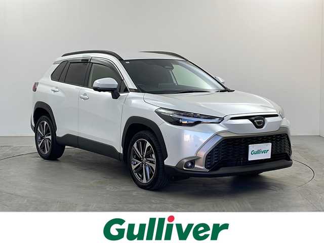トヨタ カローラ クロス ハイブリッド Z 栃木県 2024(令6)年 3.5万km プラチナホワイトパールマイカ 純正ナビ/（BT/フルセグ/AM/FM/ミラーリング）/全周囲カメラ/衝突軽減システム/レーダークルーズコントロー/車線逸脱抑制機能/横滑り防止/クリアランナソー/ブラインドスポットモニター/電動リアゲート/パーキングサポート/前席シートヒーター/ビルトインETC2.0/電動格納ミラー/ステアリングスイッチ/純正アルミホイール/純正フロアマット/プッシュスタート/スマートキー/スペアキー