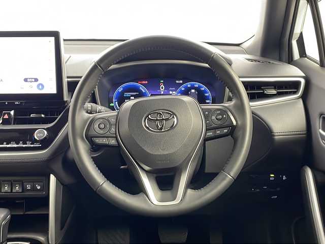 トヨタ カローラ クロス ハイブリッド Z 栃木県 2024(令6)年 3.5万km プラチナホワイトパールマイカ 純正ナビ/（BT/フルセグ/AM/FM/ミラーリング）/全周囲カメラ/衝突軽減システム/レーダークルーズコントロー/車線逸脱抑制機能/横滑り防止/クリアランナソー/ブラインドスポットモニター/電動リアゲート/パーキングサポート/前席シートヒーター/ビルトインETC2.0/電動格納ミラー/ステアリングスイッチ/純正アルミホイール/純正フロアマット/プッシュスタート/スマートキー/スペアキー