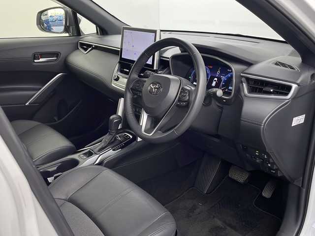 トヨタ カローラ クロス ハイブリッド Z 栃木県 2024(令6)年 3.5万km プラチナホワイトパールマイカ 純正ナビ/（BT/フルセグ/AM/FM/ミラーリング）/全周囲カメラ/衝突軽減システム/レーダークルーズコントロー/車線逸脱抑制機能/横滑り防止/クリアランナソー/ブラインドスポットモニター/電動リアゲート/パーキングサポート/前席シートヒーター/ビルトインETC2.0/電動格納ミラー/ステアリングスイッチ/純正アルミホイール/純正フロアマット/プッシュスタート/スマートキー/スペアキー