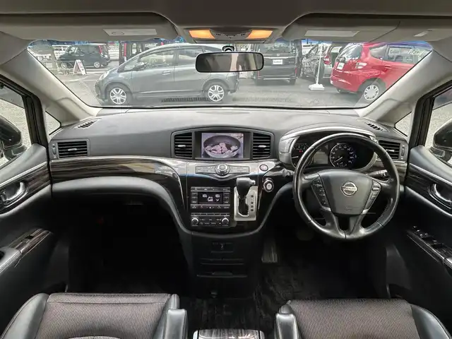 日産 エルグランド 250ハイウェイスターS 東京都 2015(平27)年 5.5万km ブリリアントホワイトパール ワンオーナー/純正メモリナビ/　フルセグTV/CD・DVD/Bluetooth/AM・FM/AUX/アラウンドビューモニター/クルーズコントロール/コーナーセンサー/ビルトインETC/パワーバックドア/センターデフロック/カーテンエアバック/ステアリングスイッチ/純正18インチアルミホイール/横滑り防止装置/純正LEDヘッドライト/フォグランプ/ドアバイザー/ウインカーミラー/プッシュスタート/スマートキー/電動格納ミラー/純正フロアマット/保証書/点検記録簿/取扱説明書
