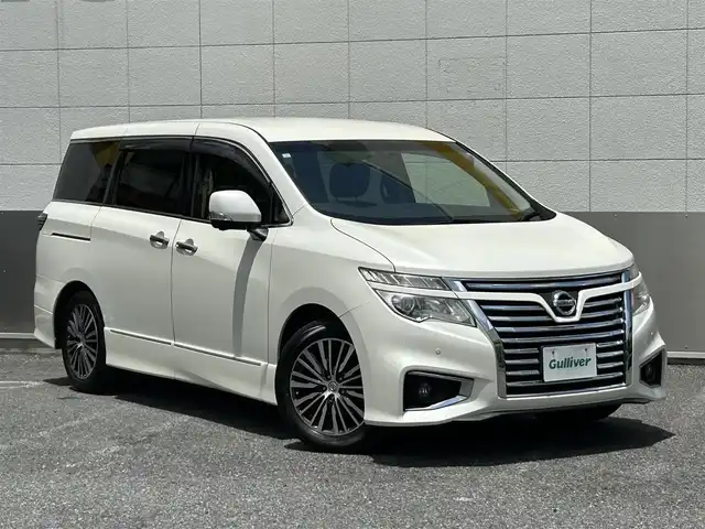 日産 エルグランド 250ハイウェイスターS 東京都 2015(平27)年 5.5万km ブリリアントホワイトパール ワンオーナー/純正メモリナビ/　フルセグTV/CD・DVD/Bluetooth/AM・FM/AUX/アラウンドビューモニター/クルーズコントロール/コーナーセンサー/ビルトインETC/パワーバックドア/センターデフロック/カーテンエアバック/ステアリングスイッチ/純正18インチアルミホイール/横滑り防止装置/純正LEDヘッドライト/フォグランプ/ドアバイザー/ウインカーミラー/プッシュスタート/スマートキー/電動格納ミラー/純正フロアマット/保証書/点検記録簿/取扱説明書