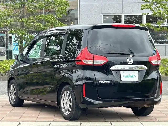 ホンダ フリード G ホンダセンシング 福島県 2021(令3)年 1.7万km クリスタルブラックパール ホンダセンシング/衝突軽減ブレーキ（CMBS）/先行車発進お知らせ機能/歩行者事故低減ステアリング/路外逸脱抑制機能/標識認識機能/渋滞追従機能付アダプティブクルーズコントロール（ACC）/車線維持支援システム（LKAS）/誤発進抑制機能/後方誤発進抑制機能/オートハイビーム/純正ナビゲーション/型番：VXM-217VFNi/【CD/DVD/SD/USB/BT/TV】/バックカメラ/ビルトインETC/両側電動スライドドア/前席シートヒーター/ステアリングリモコン/LEDオートライト/スチールホイール＋ノーマルタイヤセット車載/185/65R15/純正フロアマット/ドアバイザー