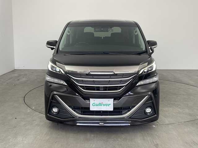 トヨタ ヴェルファイア ZA Gエディション 兵庫県 2015(平27)年 5.6万km バーニングブラッククリスタルシャインガラスフレーク ・純正ナビ/TV/Bluetooth/CD/DVD/SD/・全方位カメラ/・レーンキープアシスト/・横滑り防止装置/・前後コーナーセンサー/・クルーズコントロール/・両側パワースライドドア/・パワーバックドア/・ハーフレザーシート/・エグゼクティブシート/・ステアリングヒーター/・スマートキー/・ビルトインETC/・社外前方ドライブレコーダー/・nanoe/・メモリシート/・パワーシート/・オートマチックハイビーム/・ウッドコンビステアリング/・純正フロアマット/・フットイルミネーション/・オットマン/・社外シーケンシャルウインカー/・モデリスタエアロ/・社外車高調/・社外リアリフレクター/・純正17インチアルミホイール/・LEDオートライト/・LEDフォグランプ/・取扱説明書