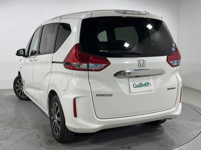 ホンダ フリード ハイブリット G ホンダセンシング 広島県 2018(平30)年 4.6万km ホワイトオーキッドパール 純正9型ナビ/両側パワースライドドア/バックカメラ/ホンダセンシング/・衝突軽減ブレーキ/・レーンキープアシスト/・レーダークルーズコントロール/・誤発進抑制機能/LEDヘッドランプ/ETC/デジタルミラー型ドラレコ