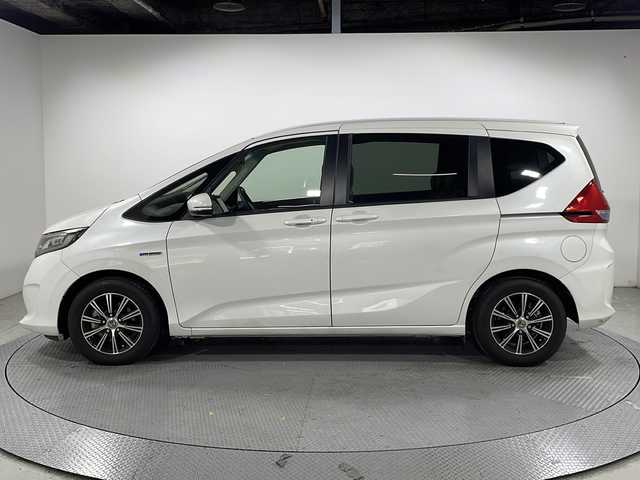 ホンダ フリード ハイブリット G ホンダセンシング 広島県 2018(平30)年 4.6万km ホワイトオーキッドパール 純正9型ナビ/両側パワースライドドア/バックカメラ/ホンダセンシング/・衝突軽減ブレーキ/・レーンキープアシスト/・レーダークルーズコントロール/・誤発進抑制機能/LEDヘッドランプ/ETC/デジタルミラー型ドラレコ