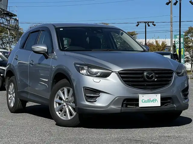 マツダ ＣＸ－５ XD Lパッケージ 道央・札幌 2016(平28)年 8.7万km ソニックシルバーM ４WD/BOSEサウンドシステム/純正SDナビ/BT/DVD/フルセグ/衝突被害軽減ブレーキ/横滑り防止装置/レーダークルーズコントロール/レーンキープアシスト/クリアランスソナー/ブラインドスポットモニター/バックカメラ/サイドカメラ/ビルトインETC/アイドリングストップ/前席パワーシート/D席メモリーシート/全席シートヒーター/レザーシート/革巻きステアリング/ステアリングリモコン/電動パーキング/自動防眩ミラー/MTモード付AT/プッシュスタート/スマートキー/LEDヘッドライト/オートライト/オートマチックハイビーム/フォグランプ/電動格納ミラー/ウィンカーミラー/純正フロアマット/ドアバイザー/スペアキー