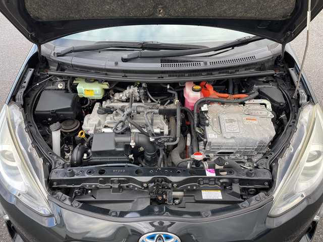 トヨタ アクア S 富山県 2015(平27)年 2.1万km ブラックマイカ 純正SDナビ/型式NSCP-W64/【ＣＤ／ＢＴ／ＡＭ／ＦＭ／ワンセグＴＶ】/ビルトインＥＴＣ　/スマートキー　/横滑り防止装置　/盗難防止装置　/アンチロックブレーキシステム　/オートライト　/フォグランプ　/純正キセノンヘッドライト　/エンジンスタートボタン　/スペアキー/オートエアコン/取扱説明書/ナビ取扱説明書