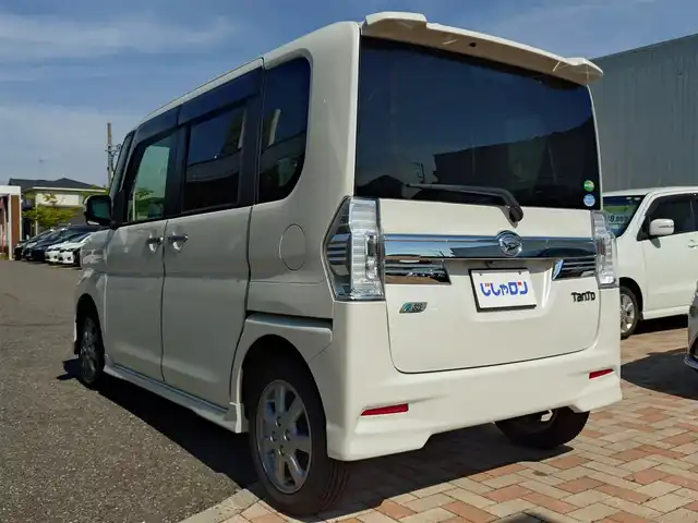 ダイハツ タント カスタム RS SA 新潟県 2014(平26)年 9.4万km パールホワイトⅢ (株)IDOMが運営する【じしゃロン新潟店】の自社ローン専用車両になります。/こちらは現金またはオートローンご利用時の価格です。自社ローンご希望の方は別途その旨お申付け下さい/社外HDDナビ/FM/AM/CD/DVD/フルセグTV視聴可能/Bluetooth接続可能/バックカメラ/ETC/両側パワースライドドア/プッシュスタート/革巻きステアリング/ダイハツ純正後席用モニター/横滑り防止装置/衝突被害軽減システム/フォグランプ/純正フロアマット/電動格納ウィンカーミラー/取扱説明書/保証書/スマートキー